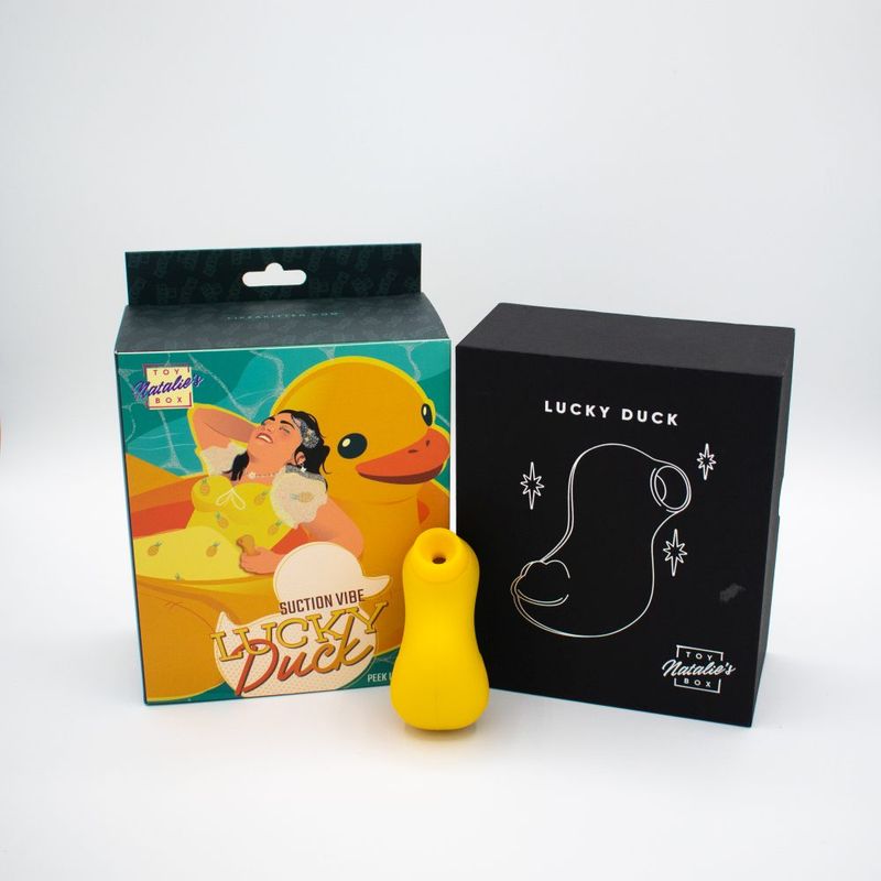 Lucky Duck suction stimulator packaging and product, featuring clitoral suction stimulator for enhanced pleasure.
