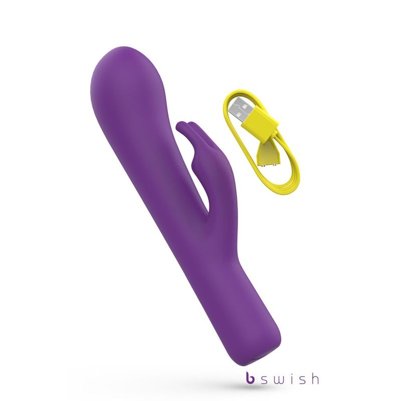 Bwild Bunny Infinite Deluxe Purple dual motor rabbit massager with USB charger displaying in a clean design.