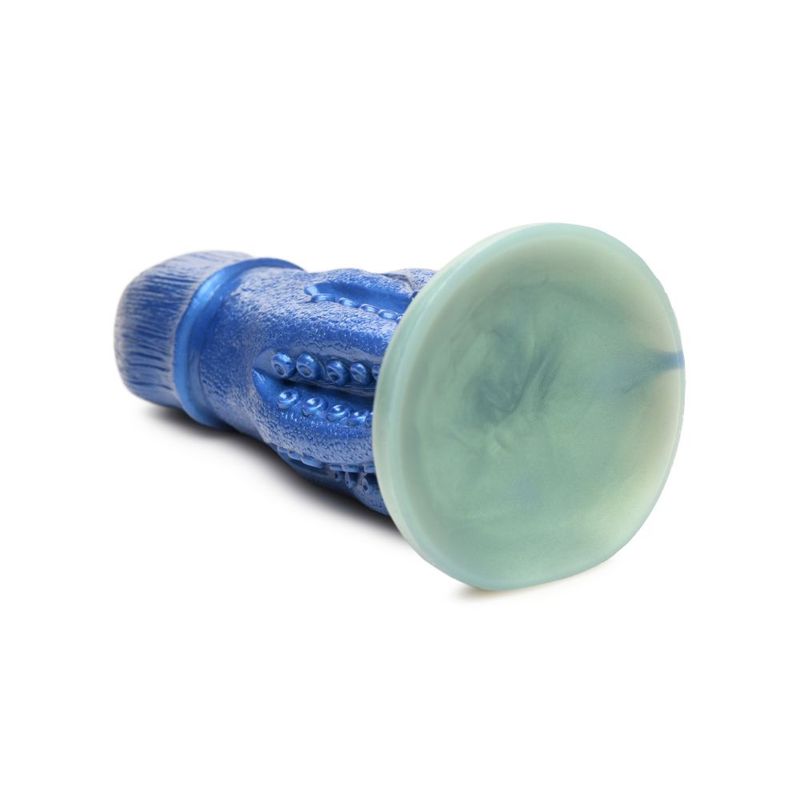 octopus silicone dildo featuring a textured blue design and a smooth green suction cup base.