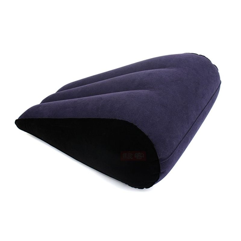 Inflatable sex positioning wedge cushion in tapered design for enhanced comfort and support during intimate moments.