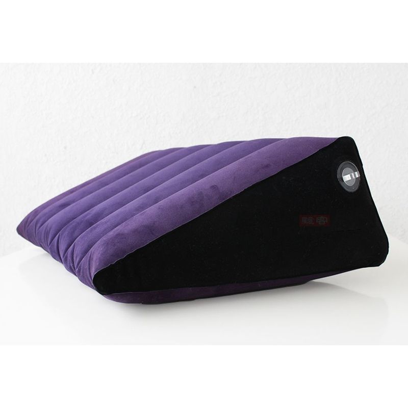 Large inflatable sex positioning wedge cushion in purple and black, ideal for enhancing intimacy and comfort.