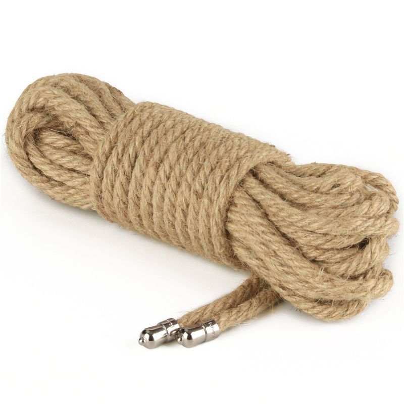 Rustic hemp bondage rope coiled neatly, showcasing its robust texture and tactile grip for traditional bondage.