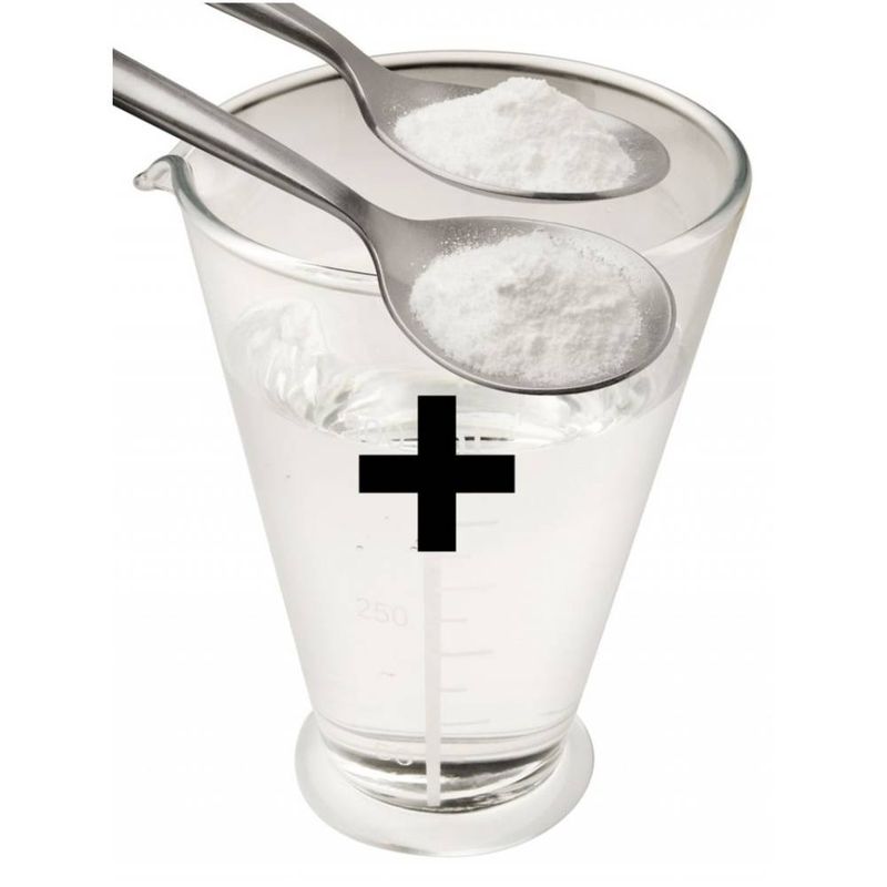 K Lube Powder 200gm (20 Litres) being mixed with water in a measuring cup to create slippery water-based lube.