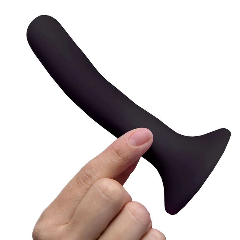 Black Silicone Strap-On Dildo Small held in hand, designed for comfortable vaginal or anal insertion.