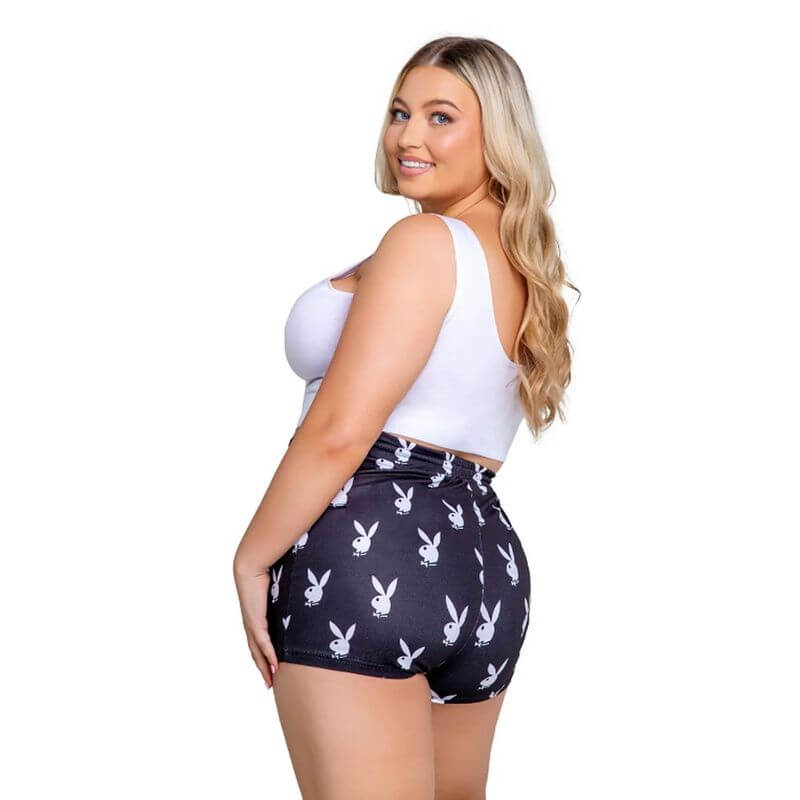Playboy Slumber Bunny 2 Pc Set Black featuring a model in high-waisted shorts and a cropped tank, showcasing a playful design.