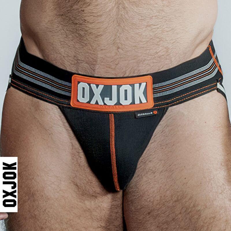 Oxballs Slingjock Upthrust Slider-Strap Jock Black Iron showcasing robust design and comfort for daily wear.