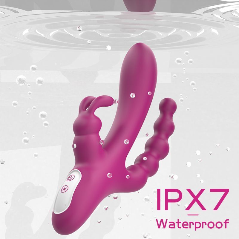 Joker Triple Ecstasy Vibrator shown in water, highlighting its IPX7 waterproof feature for ultimate pleasure.