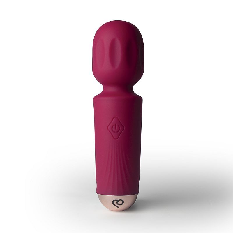 Rechargeable silicone mini wand in azalea red with a soft silicone head and travel-friendly design.