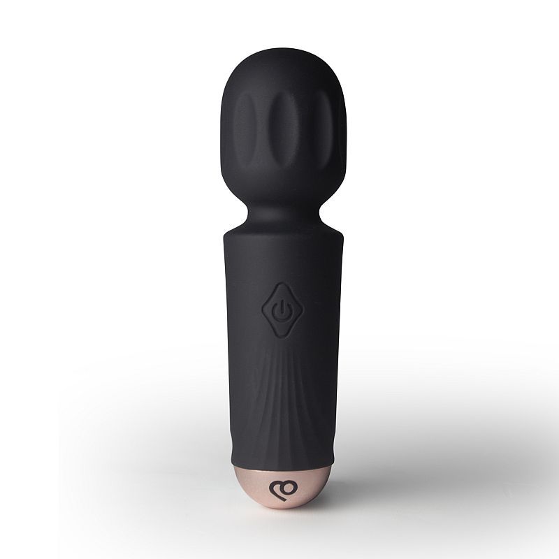 Rechargeable silicone mini wand with soft silicone head and sleek design for targeted pleasure.