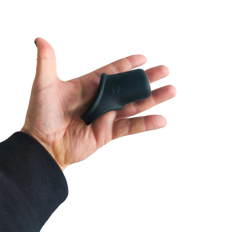 Brutus Shaft Hugger Hypersoft Cocksling held in hand, made of soft liquid silicone for comfort and support.