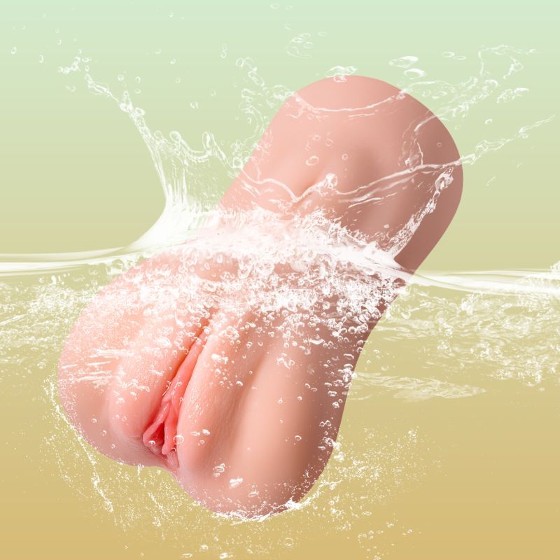 Elaine Realistic Vibrating Sucking Vaginal Masturbator in water, showcasing realistic design and lifelike texture.