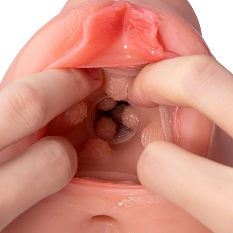Close-up of Ramar realistic vibrating masturbator showcasing its intricately textured internal channel.