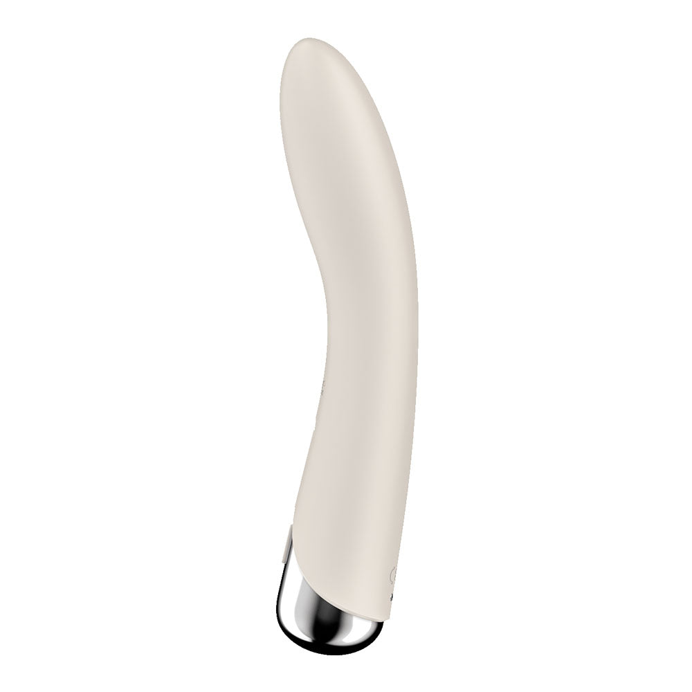 Satisfyer Spinning Vibe 1 - Beige - Beige 17.8 cm USB Rechargeable Rotating Vibrator on a white background.