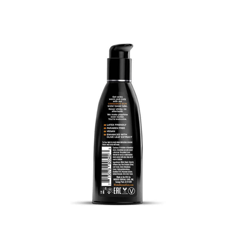Wicked Aqua Cinnamon Bun flavored lubricant bottle back label with ingredients and usage instructions.