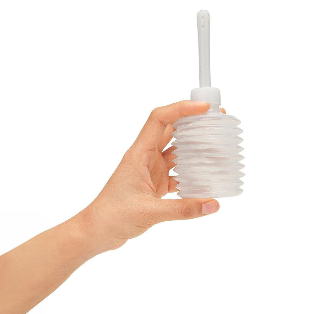 AquaClean Silicone 1-Way Valve Contoured Ergo Douche Set - 190 ml Capacity with Free Travel Douche Included in hand.