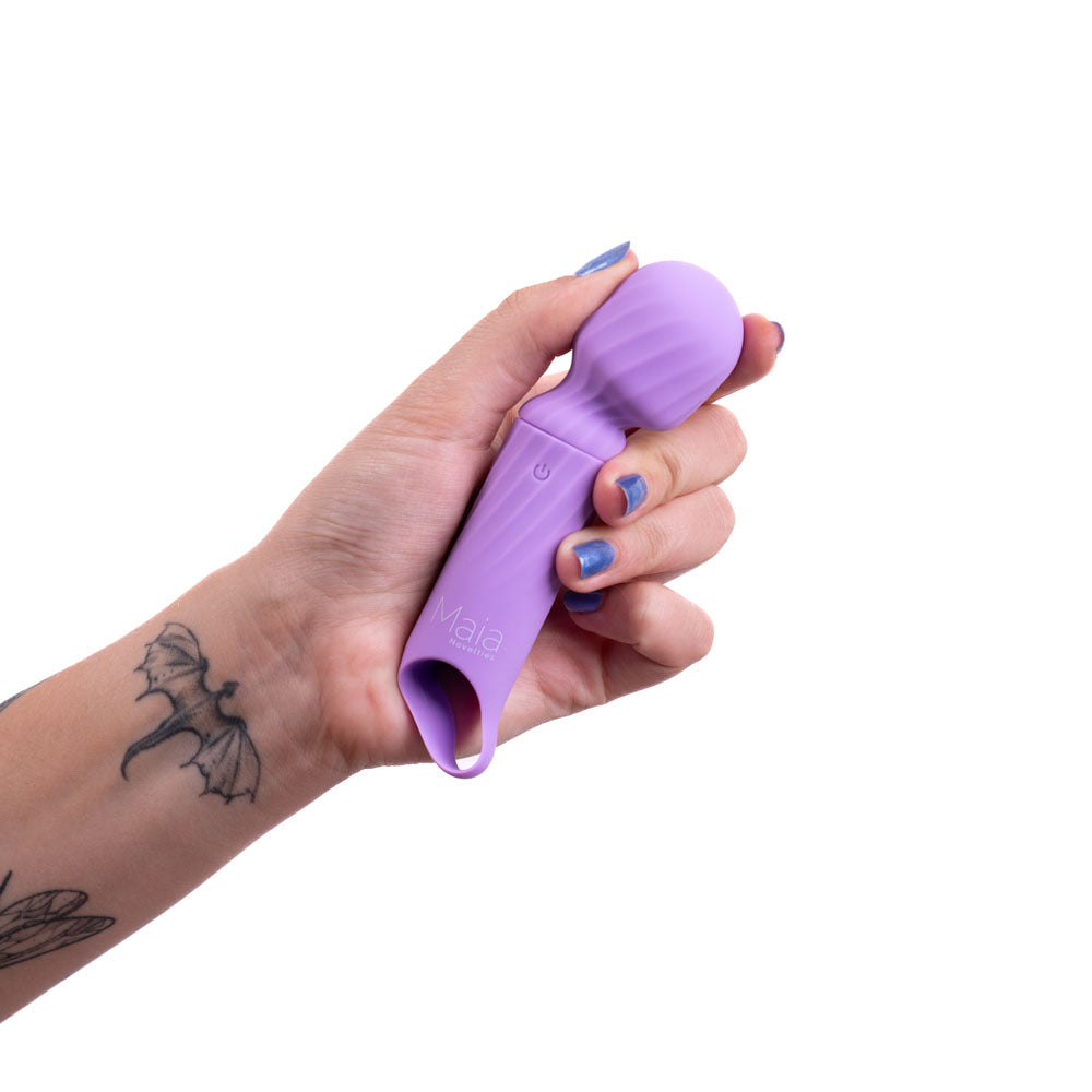 Maia DOLLY -  -  12.7 cm USB Rechargeable Massage Wand held in hand, showcasing its sleek design.