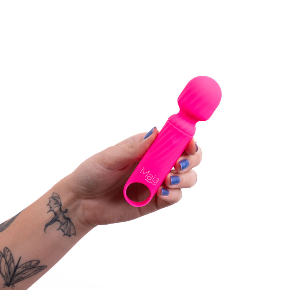 Maia DOLLY -  -  12.7 cm USB Rechargeable Massage Wand held in hand, showcasing its pink silicone design.
