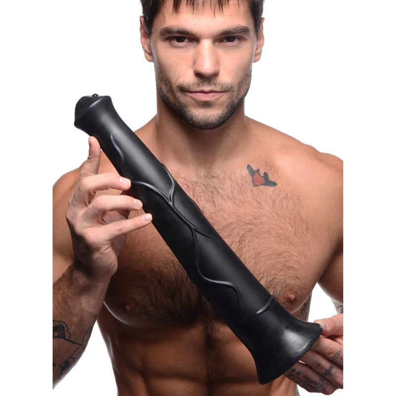 Master Cock Pony Boy -  43 cm (17'') Horse Dong held by a muscular man showcasing its realistic design and texture.