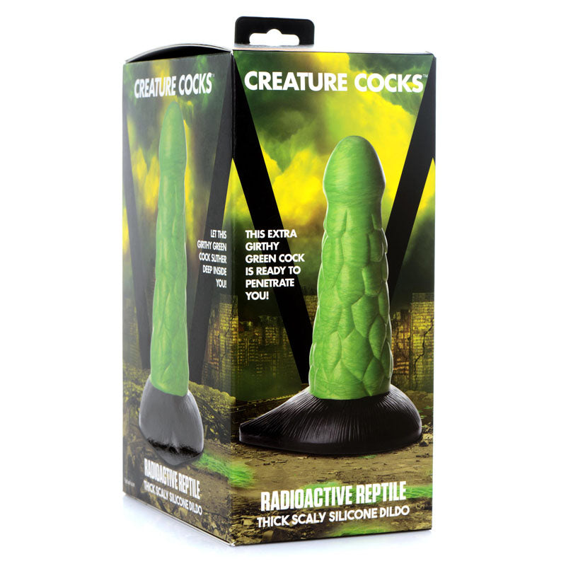Creature Cocks Radioactive Reptile Thick Scaly Silicone Dildo - 19 cm Dildo in green packaging with a suction cup base.