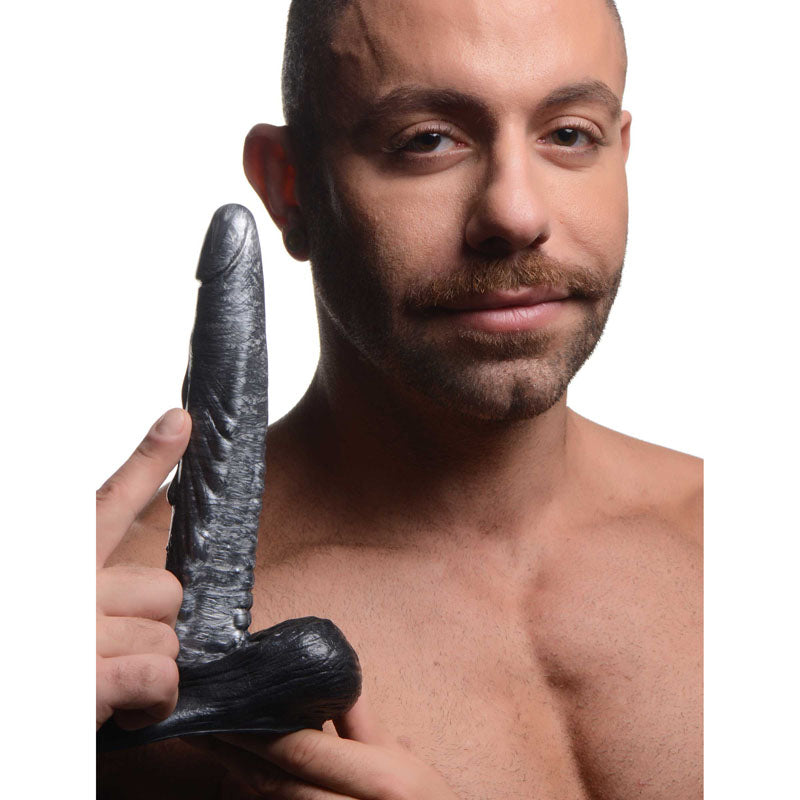 Creature Cocks The Gargoyle Rock Hard Silicone Dildo - Silver 23.6 cm Fantasy Dildo in a man's hand, showcasing its sleek design.