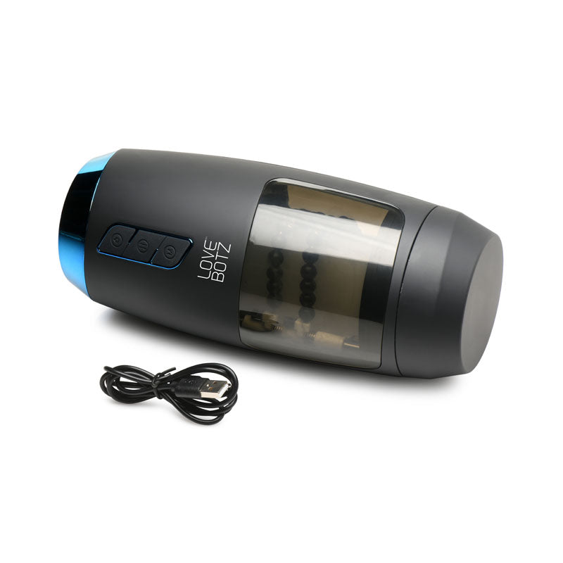 LoveBotz The Milker Slider 18X Stroking Masturbator - USB Rechargeable Stroking Masturbator with control buttons and charging cable.