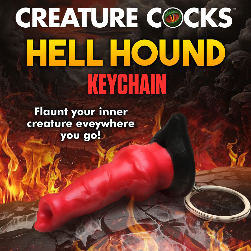 Creature Cocks Hell-Hound Keychain - Novelty Fantasy Dildo Keyring on fiery background, perfect for flaunting your inner creature.