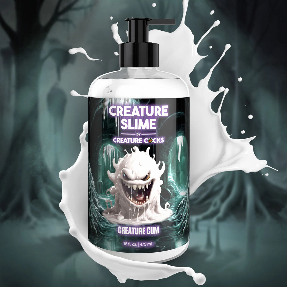 Creature Slime by Creature Cocks - Creature Cum - Cum Lubricant - 473 ml Pump Bottle in a spooky setting with splashing fluid.