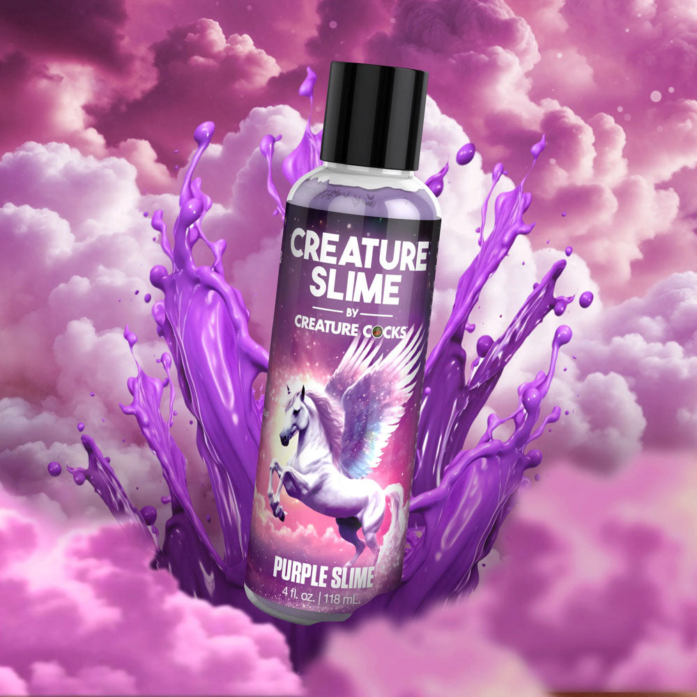 Creature Slime by Creature Cocks -  Slime -  Water Based Lubricant - 118 ml Bottle with purple cloud background.