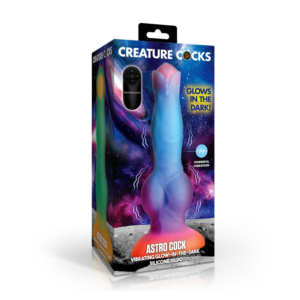 Creature Cocks Astro Cock - Glow In Dark 20.6 cm Vibrating Fantasy Dildo with Remote packaging, showcasing vibrant colors and glow effect.