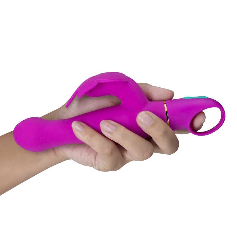Aria Naughty AF - Plum 18.4 cm Butterfly Vibrator held in hand, showcasing design for intimate essentials for her.