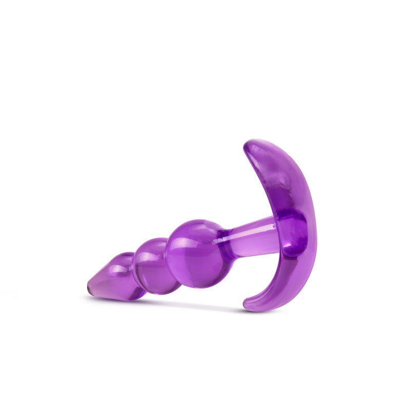 B Yours Triple Bead Anal Plug -  9.5 cm Butt Plug in purple color highlighting its beaded design for comfort and sensation.