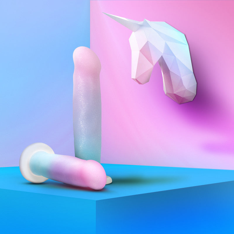 Avant - D17 - Lucky - Rainbow 20.3 cm Dong against a vibrant background with a unicorn head, showcasing colorful design.