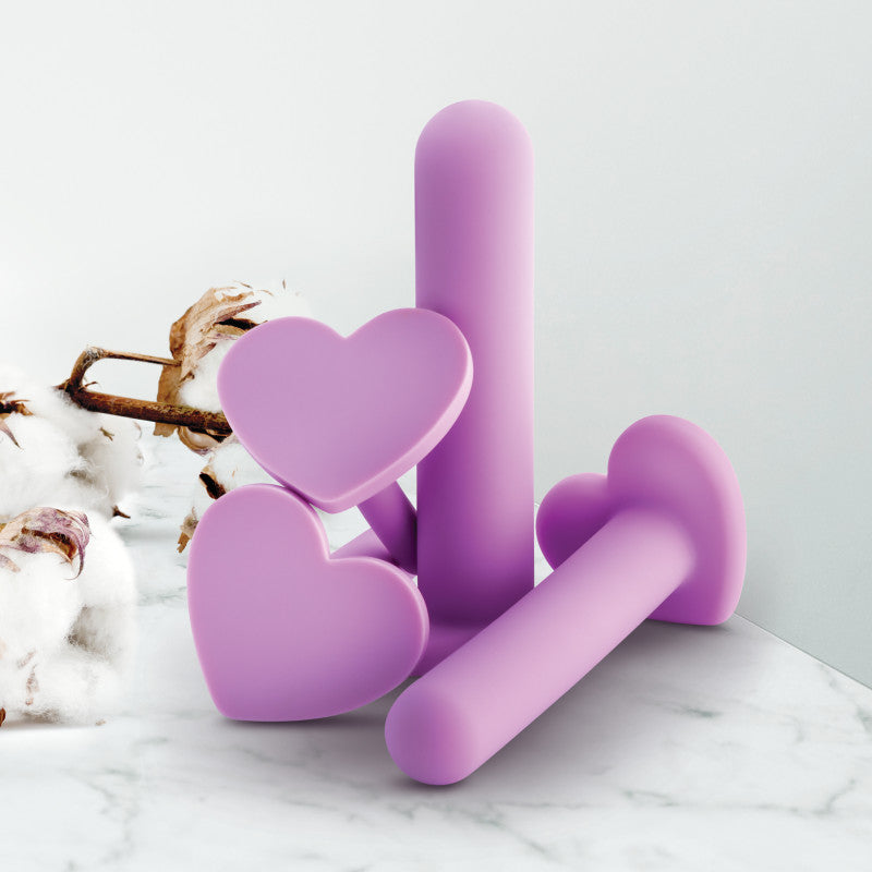 Wellness - Dilator Kit -  Vaginal Dilators - Set of 4 Sizes on a marble surface with cotton