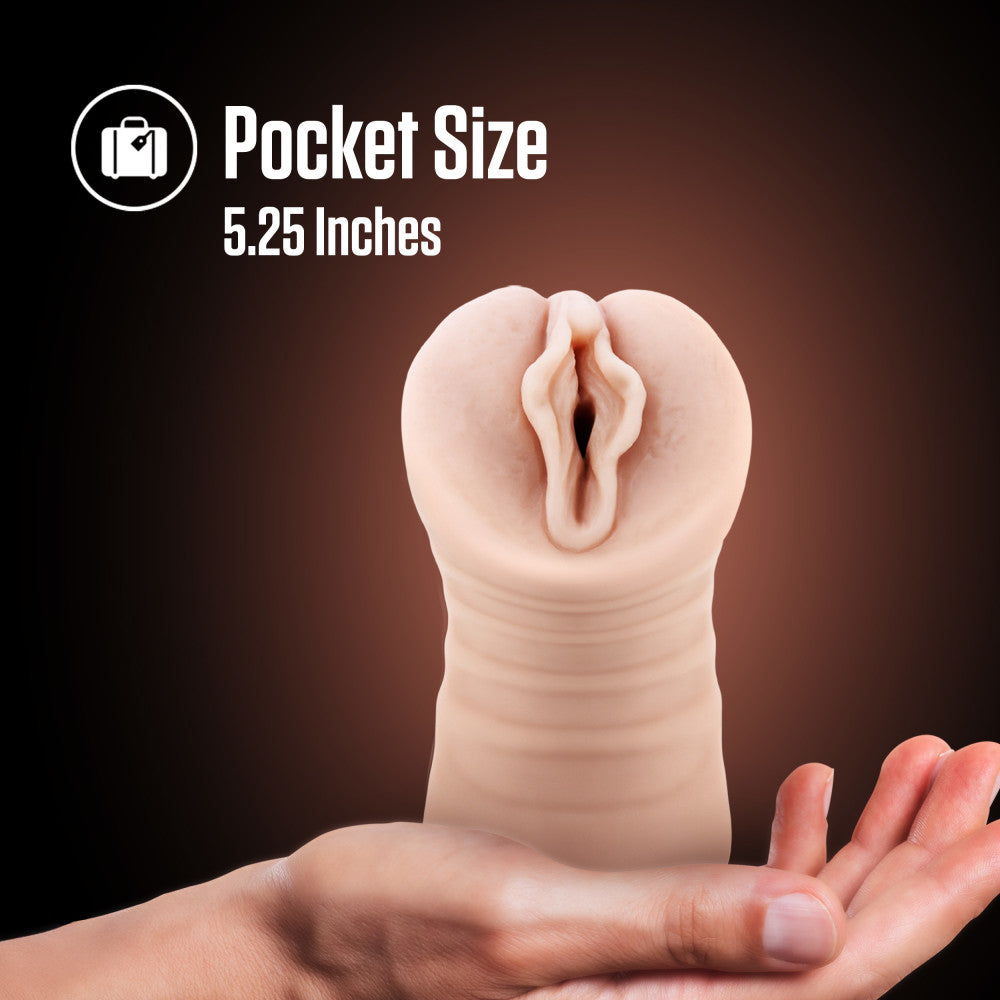 EnLust - Destini -  Vibrating Vagina Stroker shown in hand for size reference, 5.25 inches pocket size design.