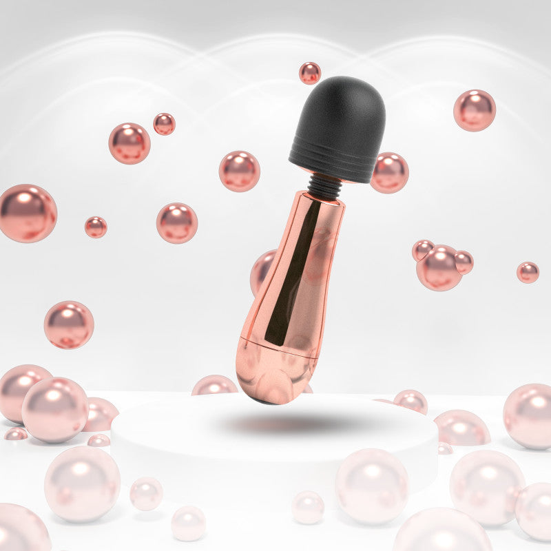 Lush Chloe -  USB Rechargeable Mini Massager Wand with rose gold accents and sleek design in a bubble background.