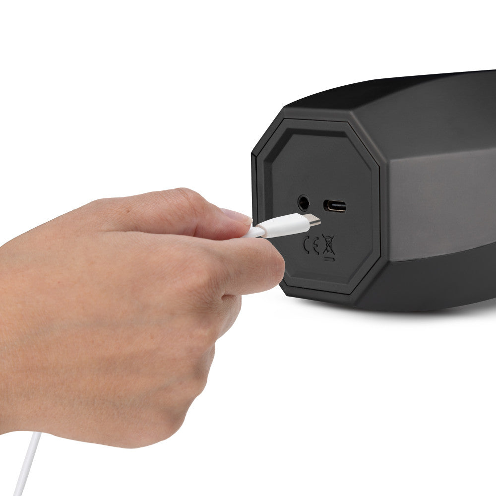 M For Men - Storm - USB Rechargeable Milking & Vibrating Auto Stroker charging port being connected.