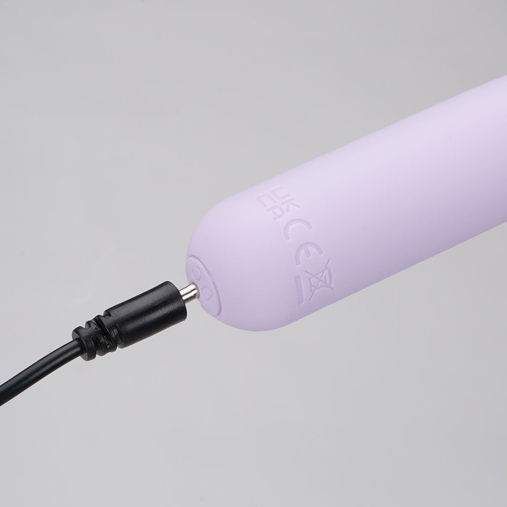 Maia TAWNI - Lavender - Lavender 9 cm USB Rechargeable Bullet with Flickering Tip charging cable close-up.