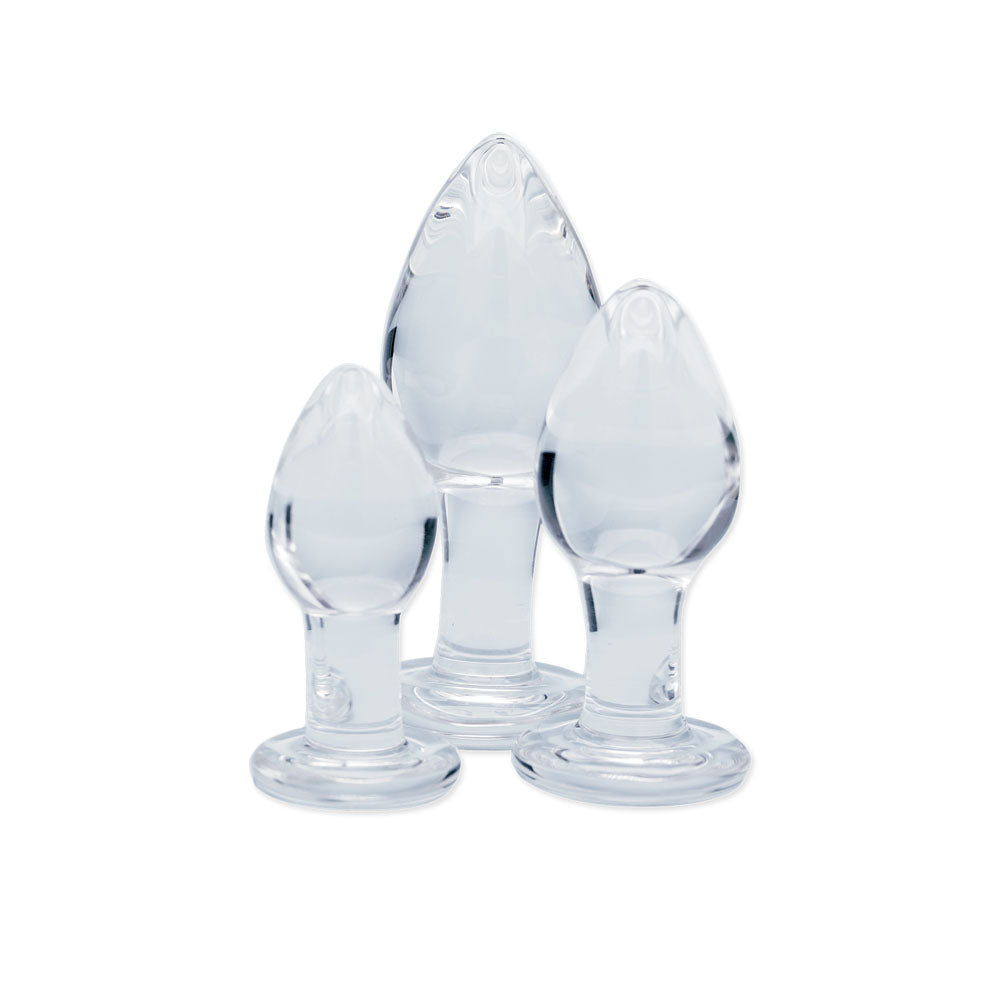 Clarity - Utopian Trinity -  Glass Butt Plugs - Set of 3 Sizes displaying three handcrafted borosilicate glass plugs.