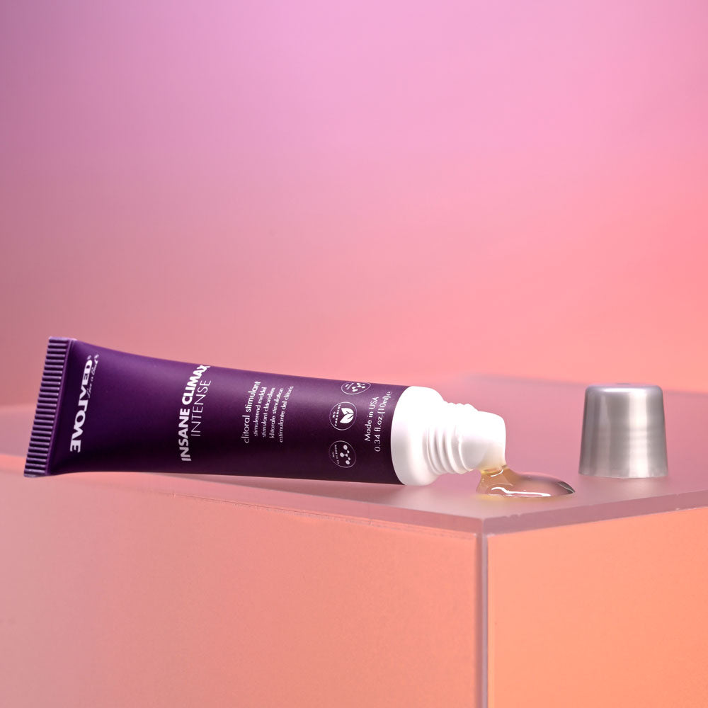 Evolved INSANE CLIMAX - INTENSE - Clitoral Stimulation Gel - 10 ml Tube with oil on a surface.