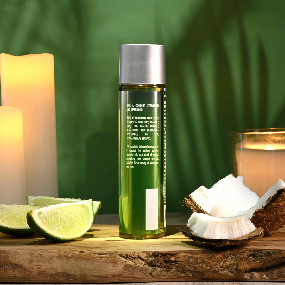 Evolved ANOINT PERFUMERY - Lime Infused Coconut - Lime Infused Coconut Massage Oil - 120 ml Bottle with lime and coconut setting.