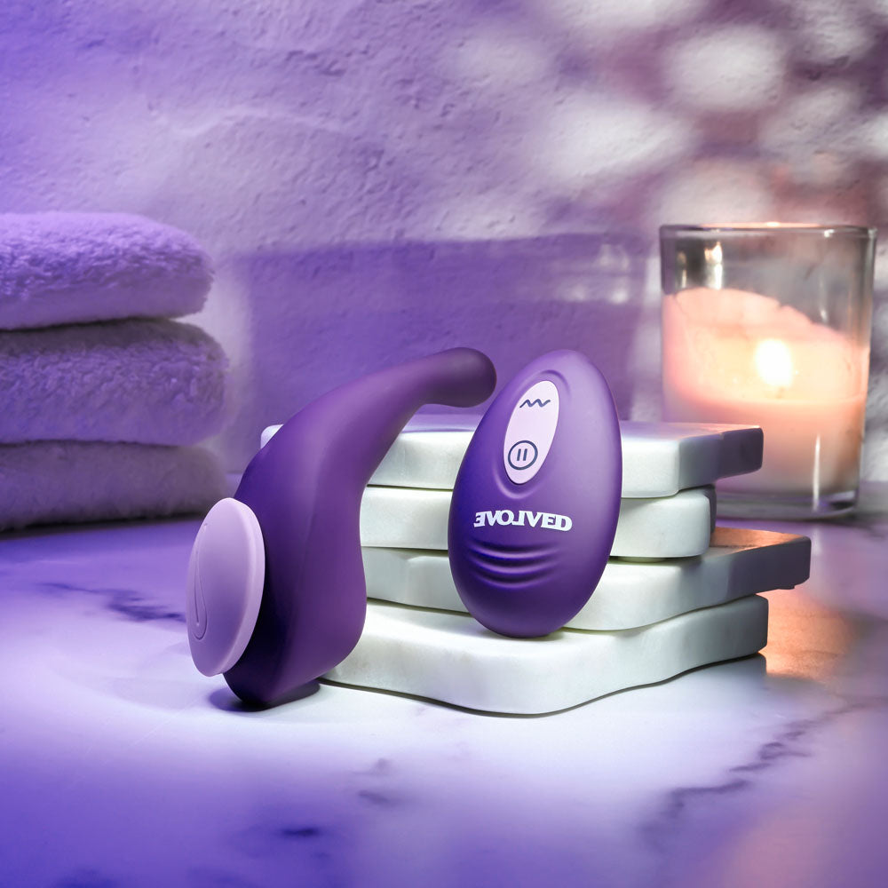 Evolved PANTY PARTY - USB rechargeable panty vibrator on a bathroom counter with soft lighting.