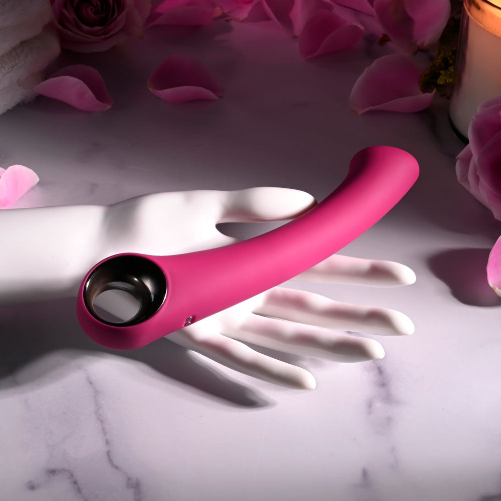 Evolved PLEASURE CURVE - 19 cm USB Rechargeable Vibrator on a hand, showcasing its sleek design and comfort features.