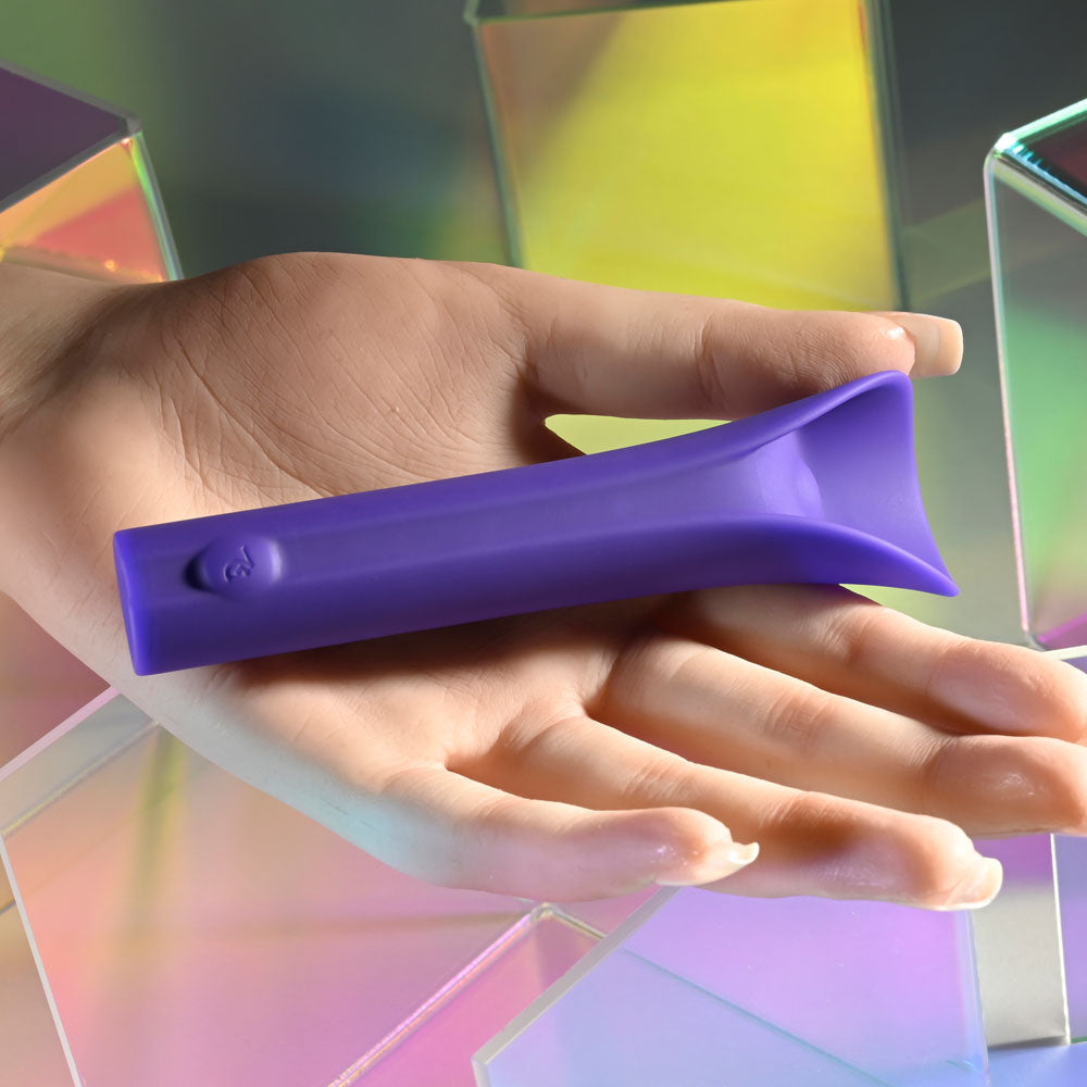 Evolved FULL COVERAGE - 11.9 cm USB Rechargeable Bullet held in a hand, showcasing its ergonomic design.