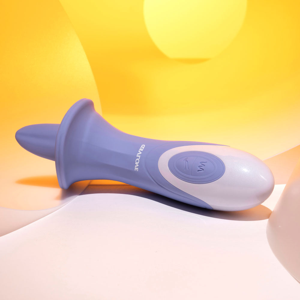 Evolved LIX & KISSES USB rechargeable tongue stimulator on a soft background for intimate pleasure.