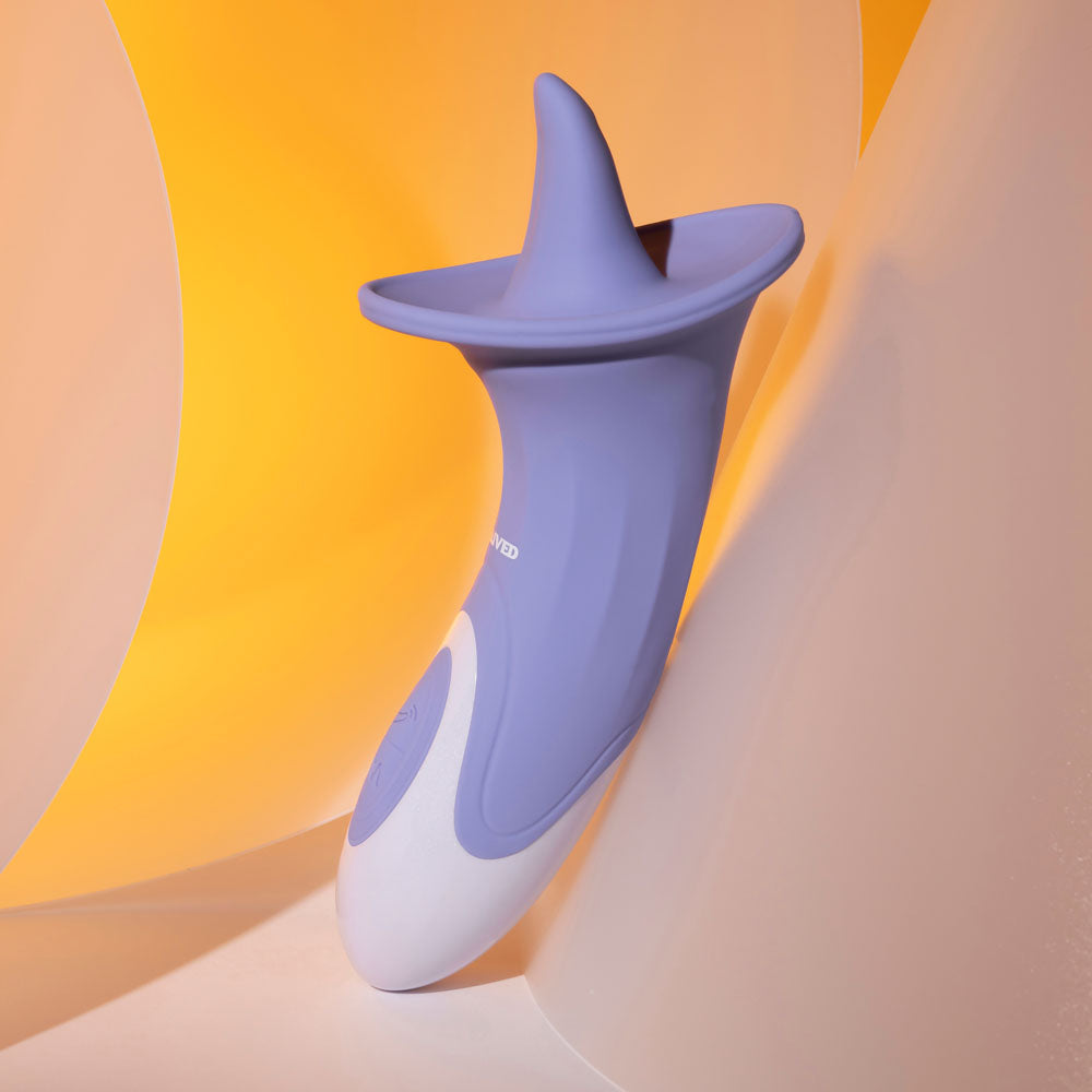 Evolved LIX & KISSES -  18.7 cm USB Rechargeable Flicking Tongue Stimulator placed against a vibrant background.