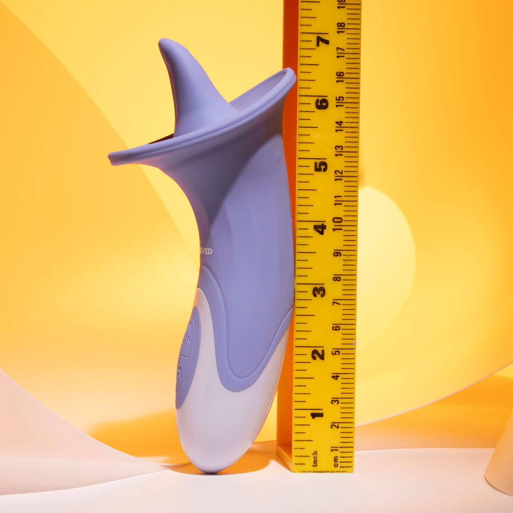 Evolved LIX & KISSES - 18.7 cm USB Rechargeable Flicking Tongue Stimulator next to a measuring tape on a colorful background.