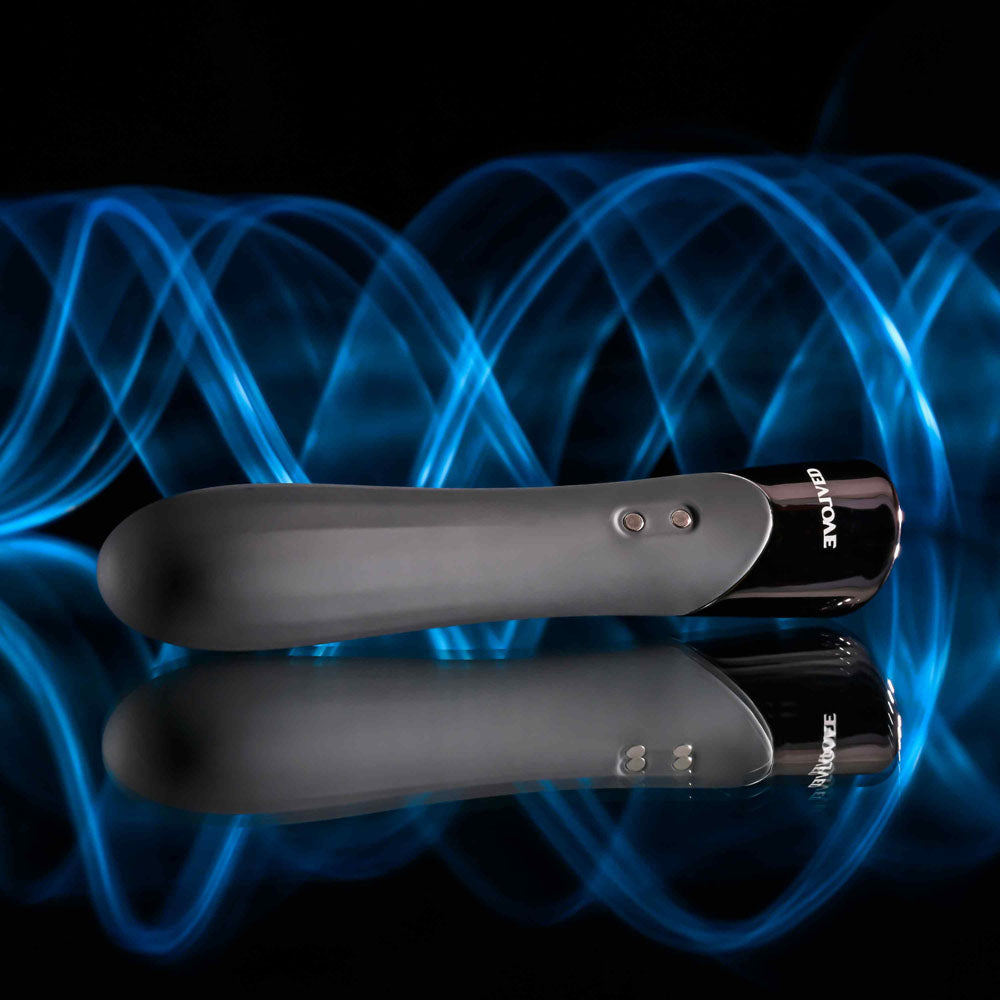 Evolved BACK IN  -  11.9 cm USB Rechargeable Bullet against a blue wave background, showcasing sleek design.
