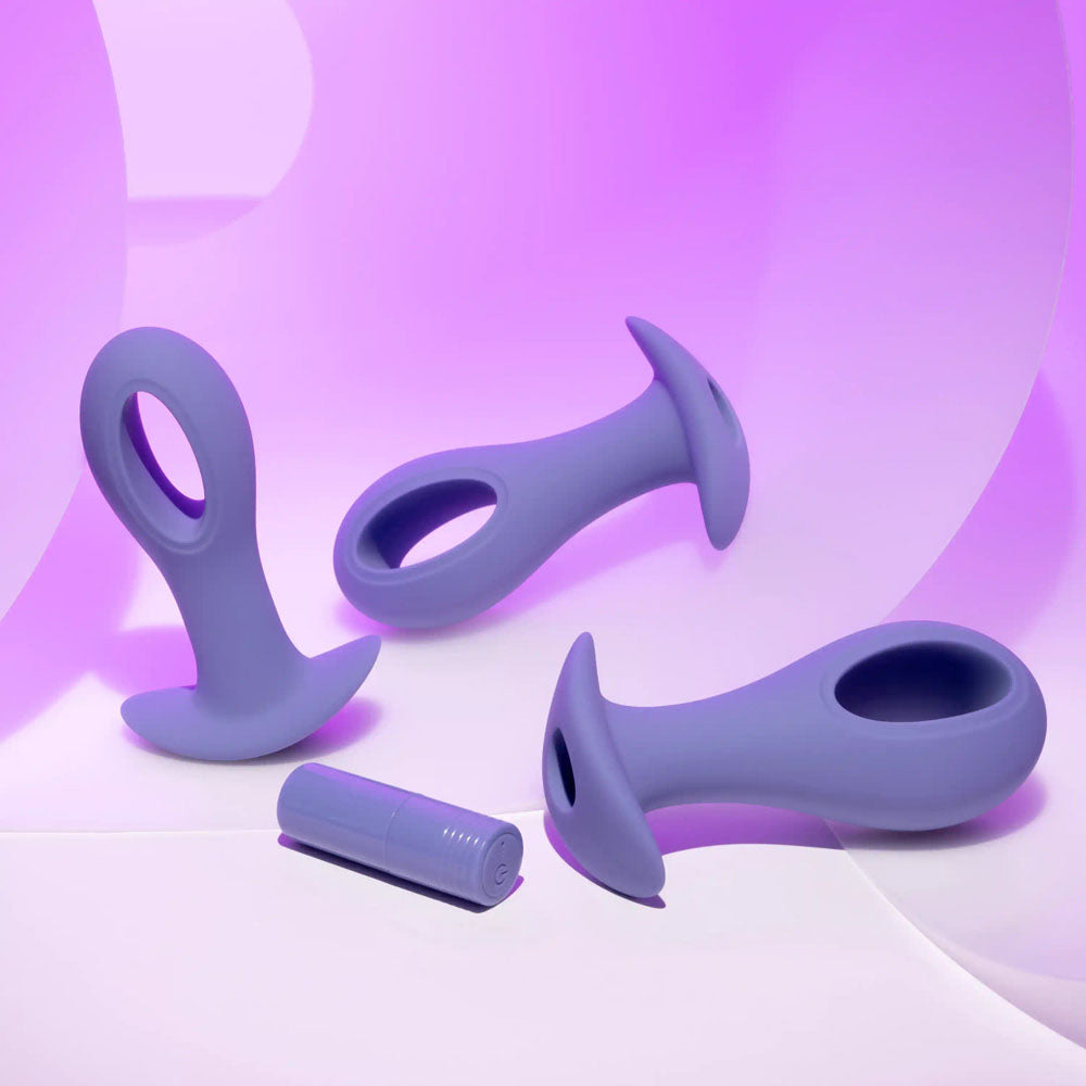 Evolved HOLE PUNCH PLUG SET -  Butt Plugs with Interchangeable Bullet - Set of 3 Sizes on a purple background.
