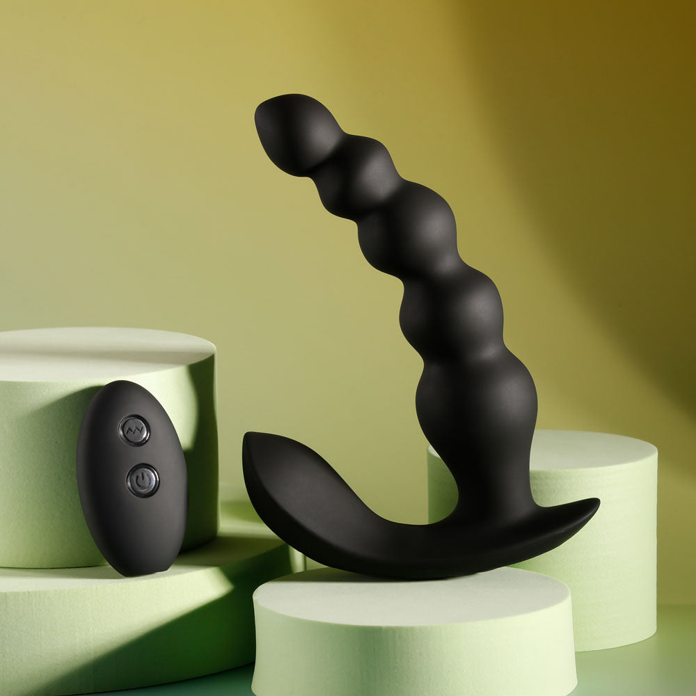 Evolved BEAD ME UP -  16.8 cm USB Rechargeable Vibrating Anal Beads with Wireless Remote on pastel pedestals.