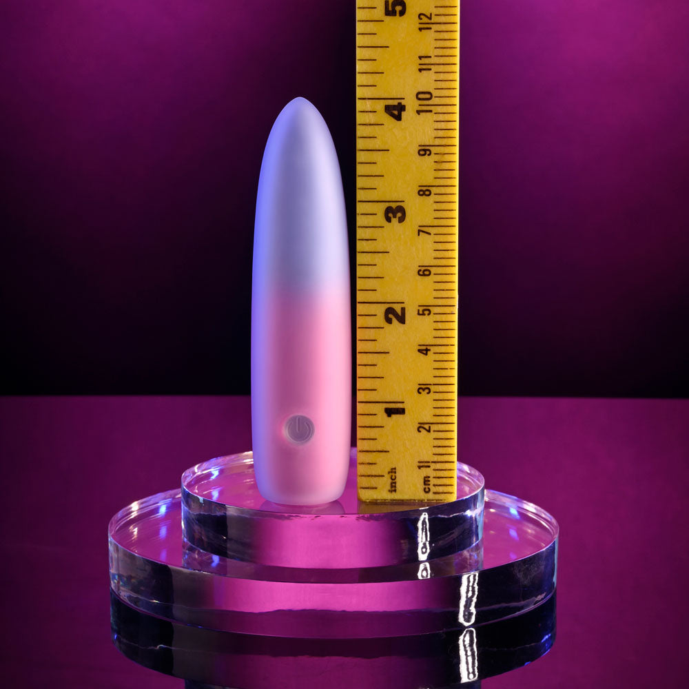 Evolved PARADISE BULLET - Pink/Purple 10.2 cm USB Rechargeable Bullet next to a ruler for size comparison.